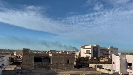 Plumes of smoke billow above Bamako after gunmen attacked at least one police base